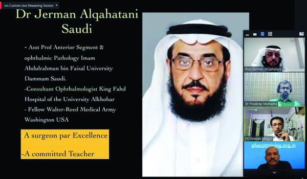  القحطاني مع أعضاء اللجنة