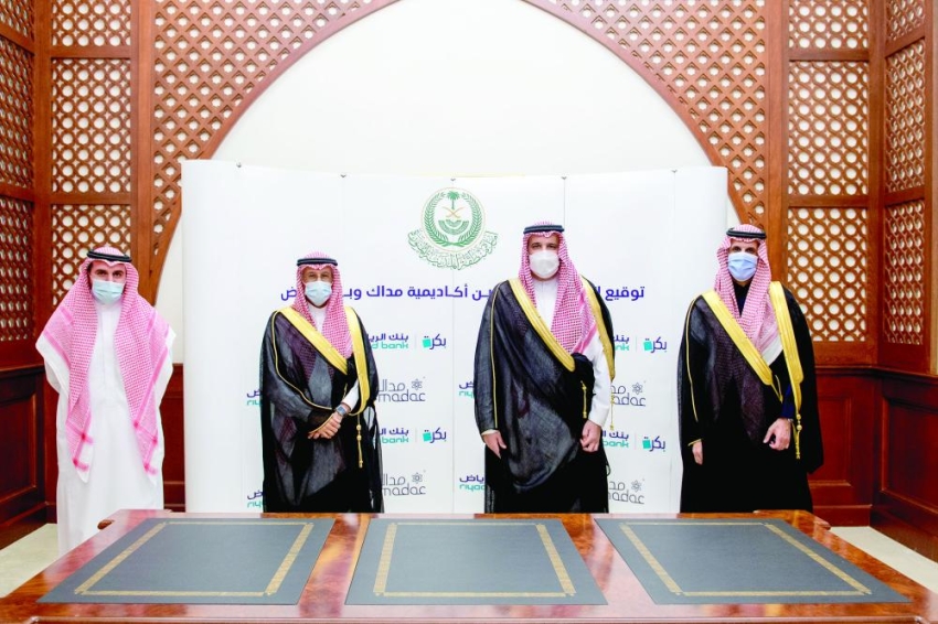 فيصل بن سلمان يوقع اتفاقية تعاون مداك مع بنك الرياض المدينة