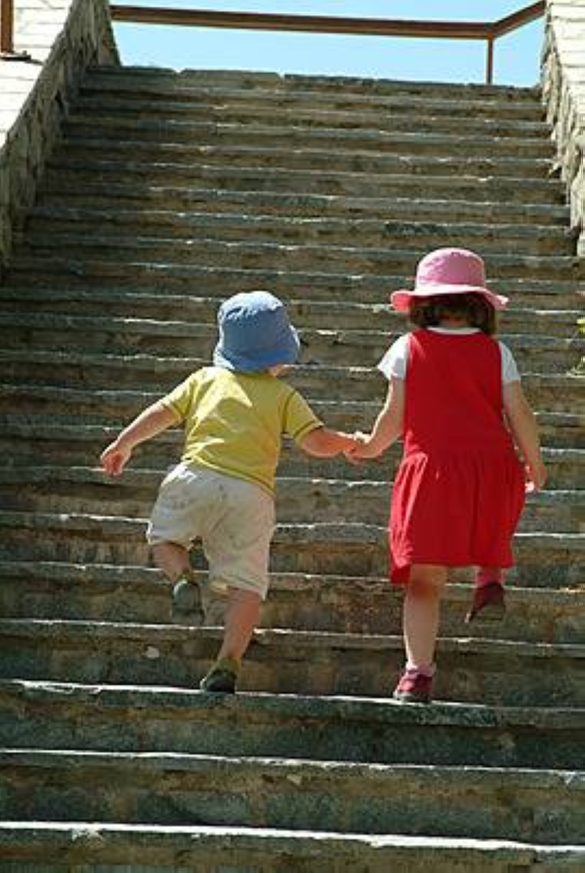 pngtree-girl-helping-small-boy-up-stairs-assist-helping-girl-photo-image_710937